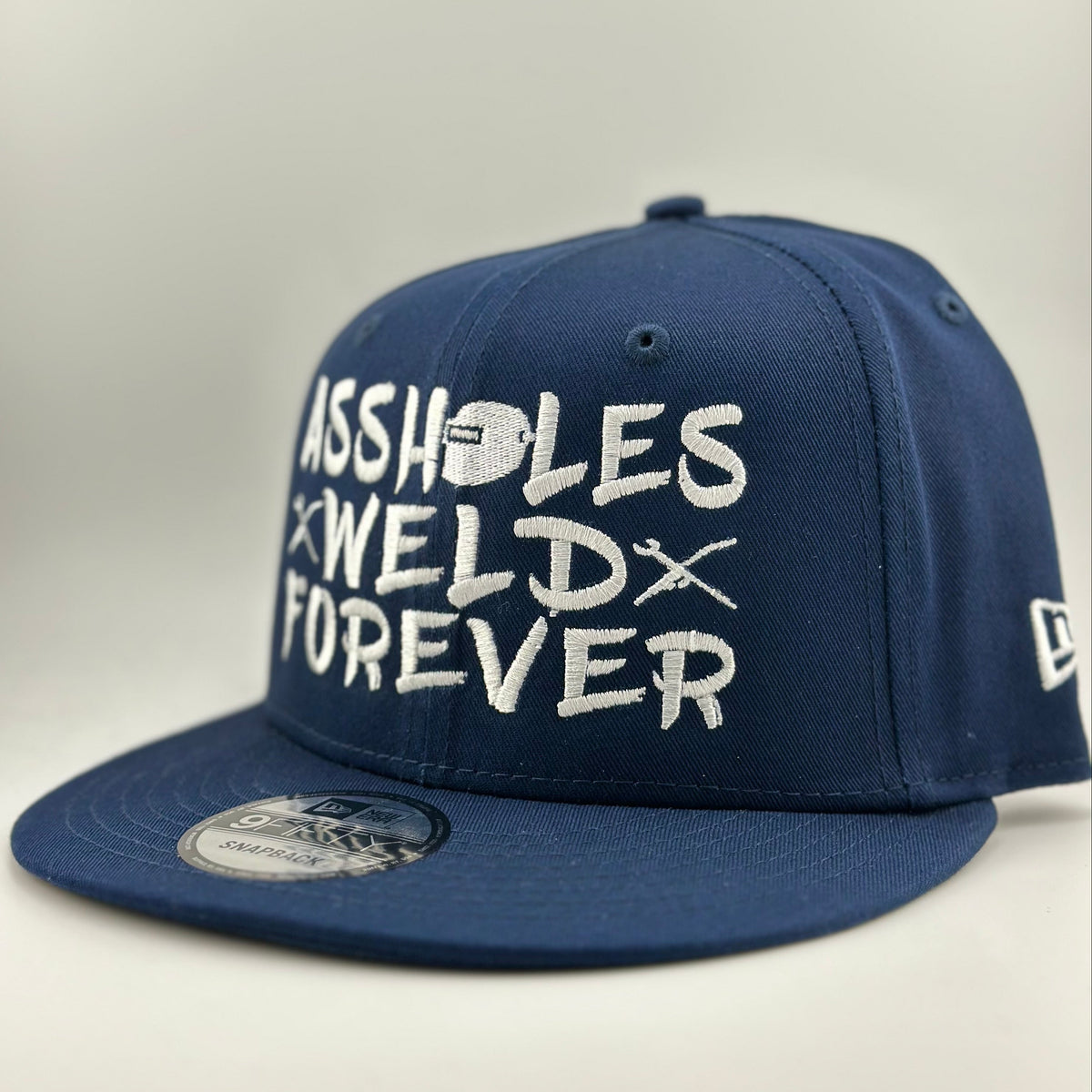 ASSHOLES WELD NEW ERA SNAPBACK